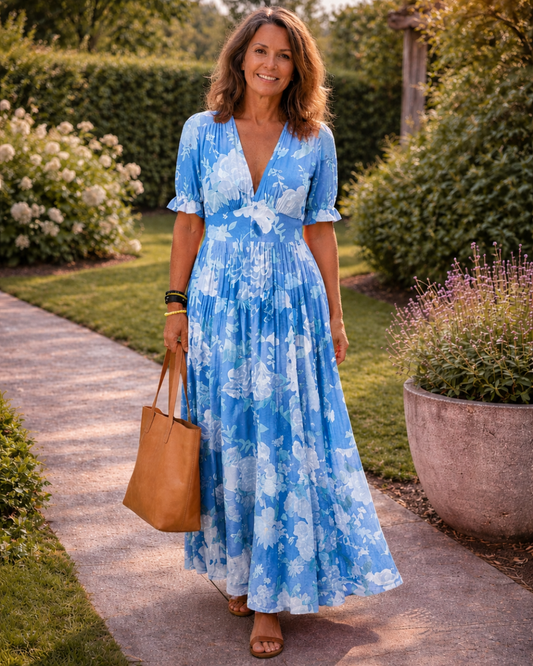 Ione | Vestido midi corto, sin mangas, con escote en V y estampado floral